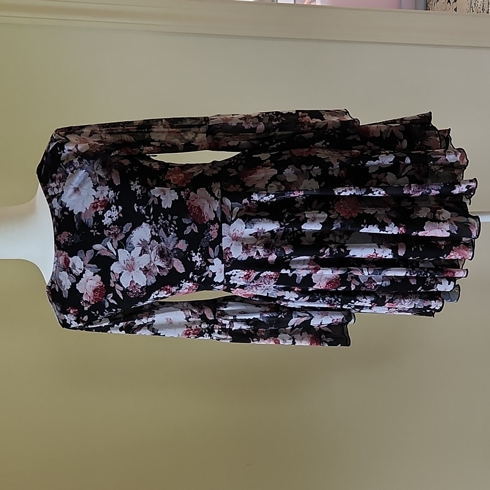 A very nice design dress.  size M